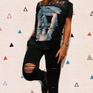 Distressed black jeggings